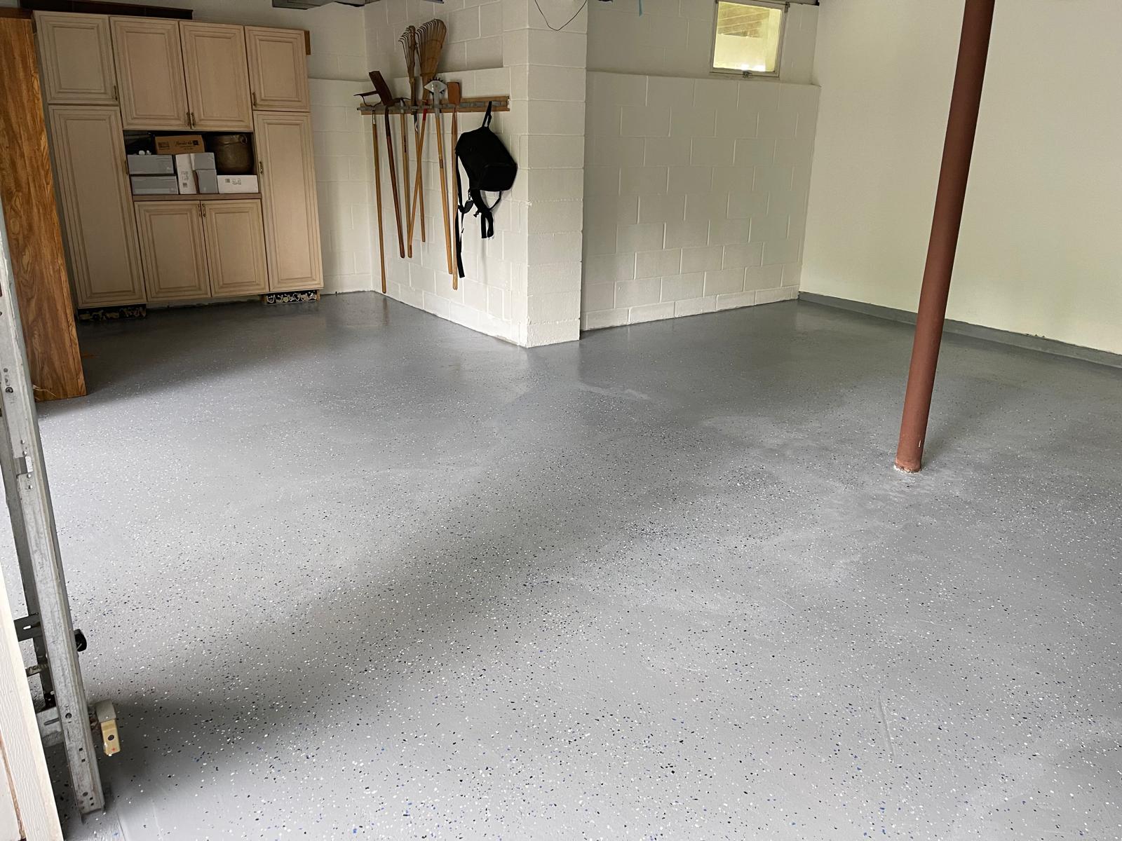 Finished epoxy garage floor with decorative flake